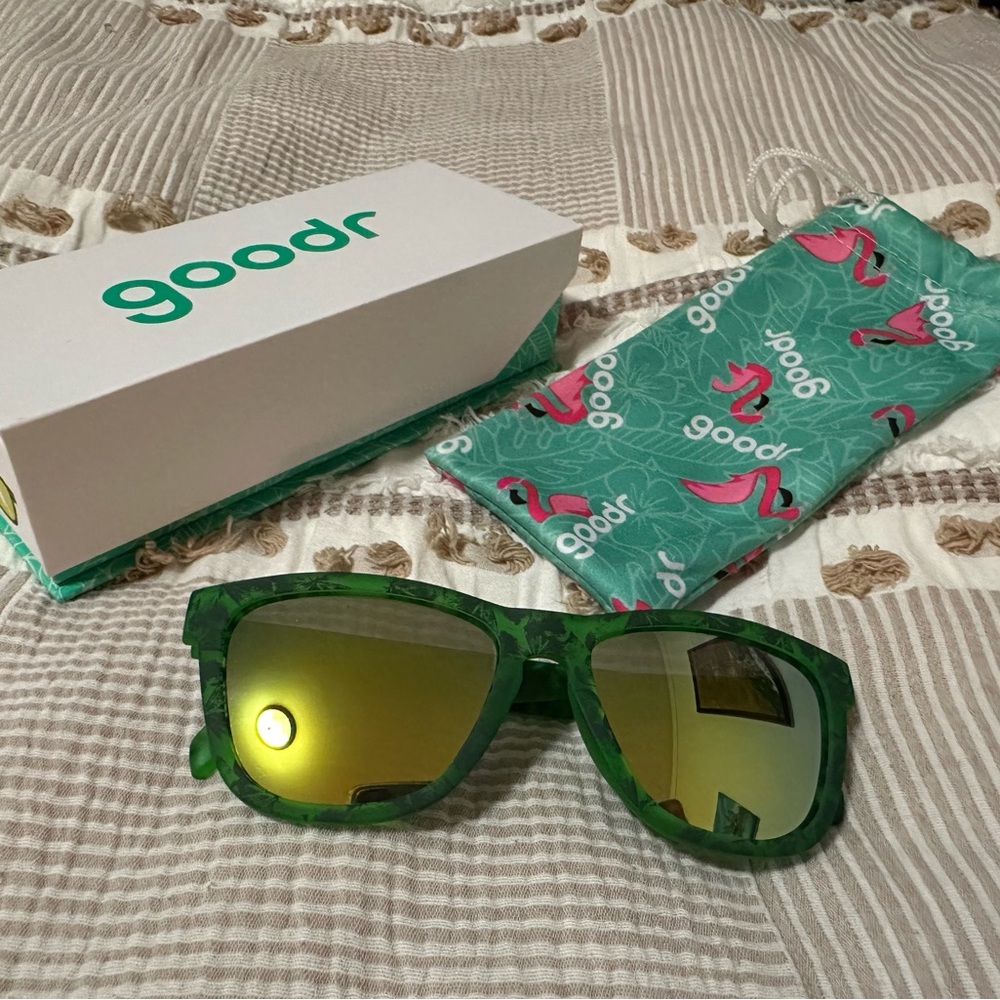 Goodr sunglasses in “Clover me in gold”